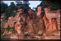 Da Fo (Grand Buddha) and two guardians seen from the river. Leshan, Sichuan, China