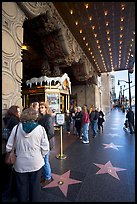 Stars of the Walk of fame in front of the  El Capitan Theatre. Hollywood, Los Angeles, California, USA ( color)