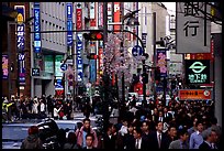 Street in Shinjuku 3-chome looking towards Yotsuya in front of Kinokuniya. Tokyo, Japan ( color)