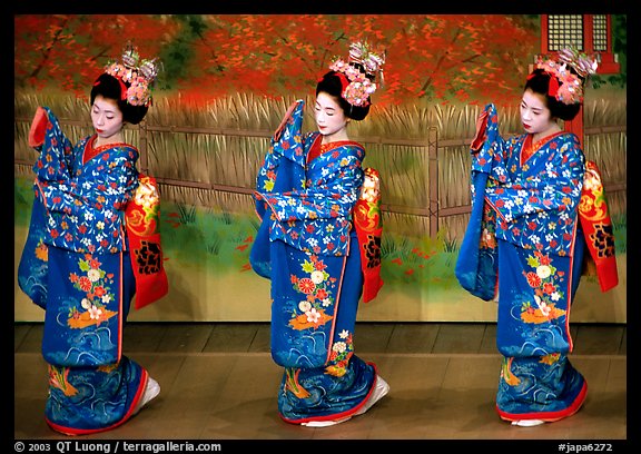 Maiko (apprentice Geisha) dress elaborately to perform the Miyako Odori (cherry blossom dance). Kyoto, Japan (color)