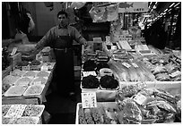 Seafood vendor in a popular street. Tokyo, Japan ( black and white)