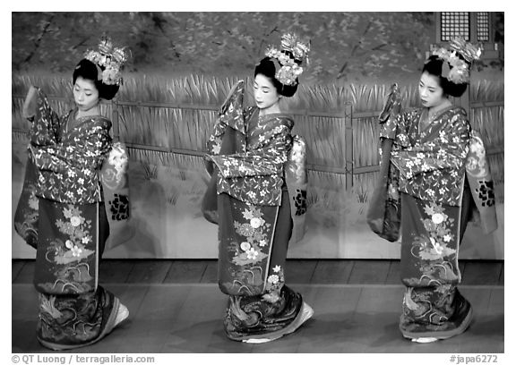 Maiko (apprentice Geisha) dress elaborately to perform the Miyako Odori (cherry blossom dance). Kyoto, Japan (black and white)