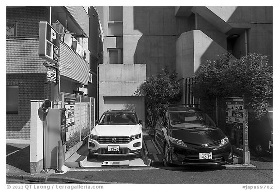 Parking lot for two cars. Tokyo, Japan (black and white)