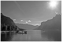 Lake Minnewanka (only lake in the Park that allows motorized boats) and marina, morning.. Banff National Park, Canadian Rockies, Alberta, Canada (black and white)