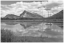 Canoe on first Vermillion Lake, afternon. Banff National Park, Canadian Rockies, Alberta, Canada (black and white)