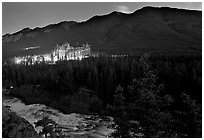 Banff Springs Hotel, Bow River and Falls at night. Banff National Park, Canadian Rockies, Alberta, Canada (black and white)