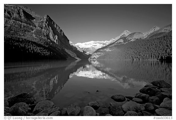 Mountains reflected in Lake Louise, early morning. Banff National Park, Canadian Rockies, Alberta, Canada
