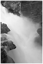 Water cascading over a glacial rock step, Athabasca Falls. Jasper National Park, Canadian Rockies, Alberta, Canada (black and white)