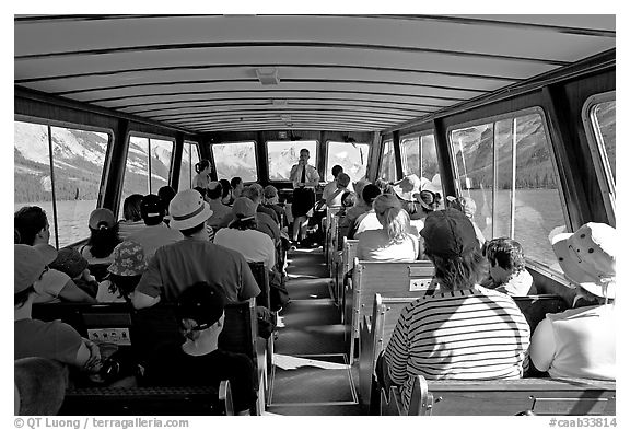 Aboard the tour boat on Maligne Lake. Jasper National Park, Canadian Rockies, Alberta, Canada (black and white)