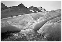 Glacial stream at the toe of Athabasca Glacier. Jasper National Park, Canadian Rockies, Alberta, Canada ( black and white)