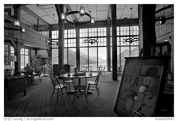 High Tea sign and lobby of historic Prince of Wales hotel. Waterton Lakes National Park, Alberta, Canada (black and white)