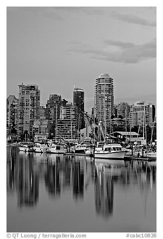 Small boat harbor and skyline at dusk. Vancouver, British Columbia, Canada (black and white)