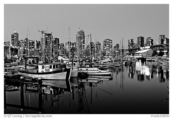 Fishing boats and skyline at night. Vancouver, British Columbia, Canada (black and white)