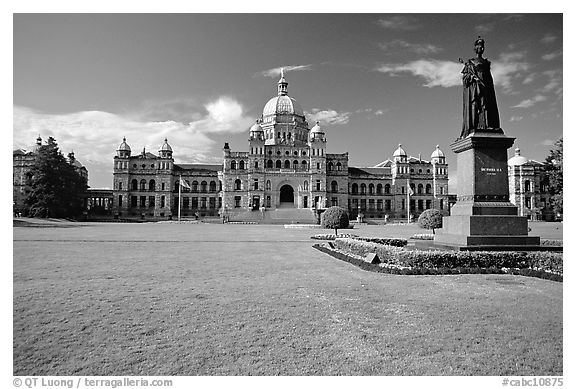 Lawn, statue of Queen Victoria for whom the city was named, and parliament. Victoria, British Columbia, Canada (black and white)
