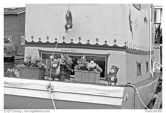 Houseboat decorated with a monkey theme. Victoria, British Columbia, Canada (black and white)