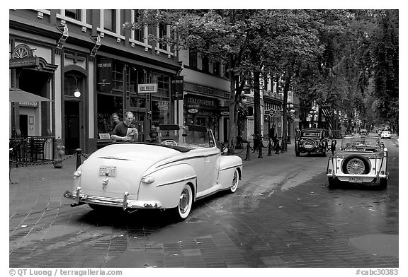 Classic cars in Water Street Vancouver British Columbia Canada black and 