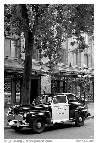Old Police car in Water Street. Vancouver, British Columbia, Canada (black and white)