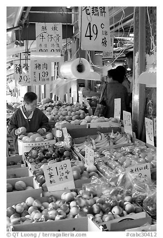 Fruit store in Chinatown. Some of the tropical fruit cannot be imported to the US. Vancouver, British Columbia, Canada (black and white)