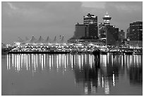 Canada Palace at night and Harbor Center at night. Vancouver, British Columbia, Canada ( black and white)