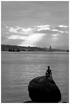 Girl in wetsuit statue, sunrise, Stanley Park. Vancouver, British Columbia, Canada (black and white)