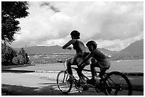 Tandem bicyclist on the trail around Stanley Park. Vancouver, British Columbia, Canada ( black and white)