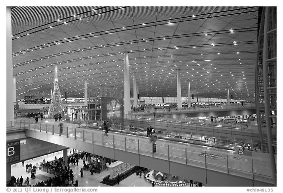 Inside main concourse at dusk, Beijing Capital International Airport. Beijing, China (black and white)
