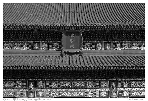 Roof detail and sign on Hall of Supreme Harmony, Forbidden City. Beijing, China (black and white)