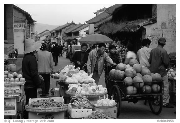 Fruits for sale on an old street. Dali, Yunnan, China (black and white)
