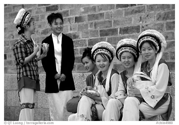Women wearing traditional Bai dress. Dali, Yunnan, China (black and white)