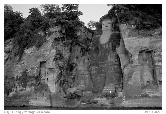 Da Fo (Grand Buddha) and two guardians seen from the river. Leshan, Sichuan, China (black and white)