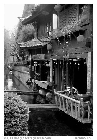 Restaurant across the canal. Lijiang, Yunnan, China (black and white)