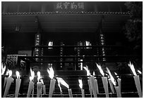 Candles burning in front of Wannian Si temple. Emei Shan, Sichuan, China (black and white)