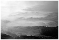 Receding ridges in fog, seen from Jinding Si, morning. Emei Shan, Sichuan, China (black and white)