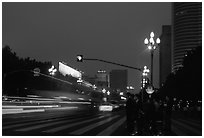 Lights of the trafic in a large avenue. Chengdu, Sichuan, China (black and white)