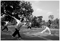 Collective exercise gymnastics with swords,  Liuha Park. Guangzhou, Guangdong, China (black and white)