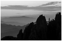 Spires and ridges at sunrise. Huangshan Mountain, China ( black and white)
