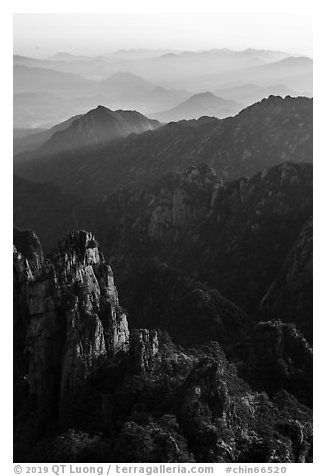 Spires and distant ridges. Huangshan Mountain, China (black and white)