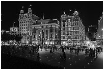 Colonial-area buildings illuminated at night, the Bund. Shanghai, China ( black and white)
