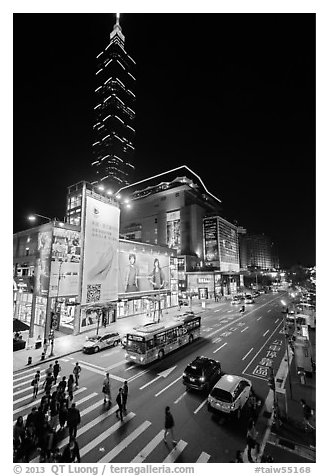 Shopping district street at night and Taipei 101. Taipei, Taiwan (black and white)