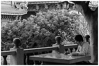 Man reading, Guandu Temple. Taipei, Taiwan (black and white)