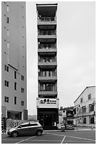 Tall and thin hotel building. Sun Moon Lake, Taiwan ( black and white)