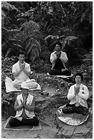 Members of religious sect in meditation. Sun Moon Lake, Taiwan ( black and white)