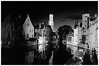 Old houses and beffroi Quai des Rosaires, night. Bruges, Belgium (black and white)