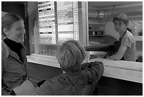 Women at a fries booth. Bruges, Belgium (black and white)