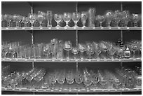 Large variety of glasses used to drink specific beers. Bruges, Belgium (black and white)