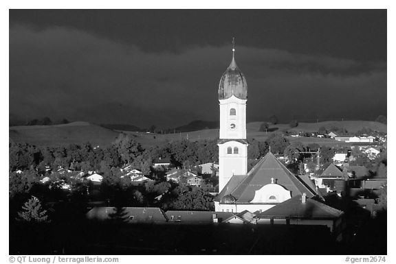 Nesselwang and St Andreas church, storm light. Bavaria, Germany (black and white)