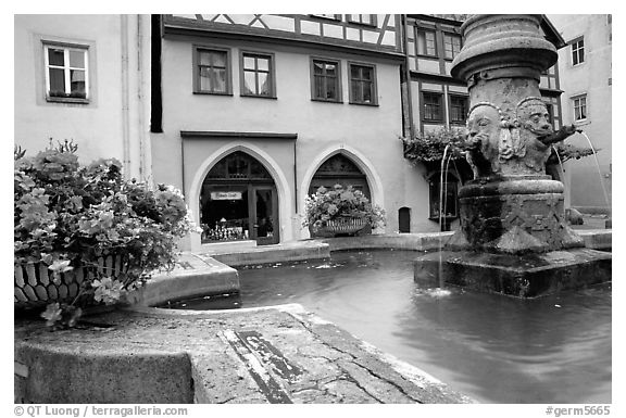 Fountain and houses. Rothenburg ob der Tauber, Bavaria, Germany (black and white)