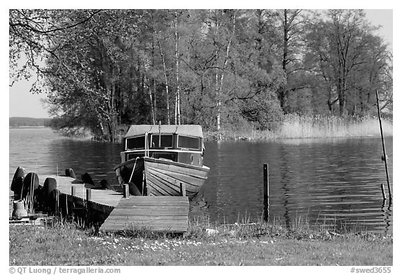 Boat on lakeshore. Central Sweden (black and white)
