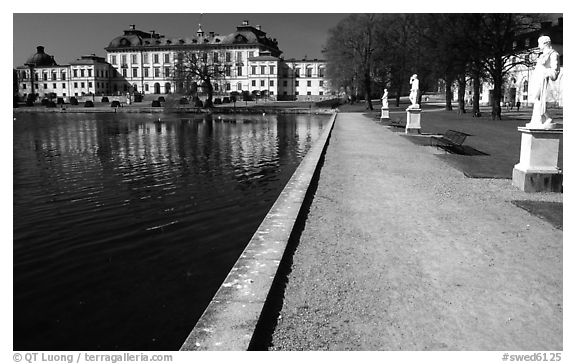 Basin and an alley in royal residence of Drottningholm. Sweden (black and white)