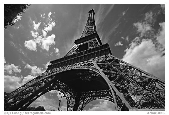 Wide view of Eiffel tower from its base. Paris, France (black and white